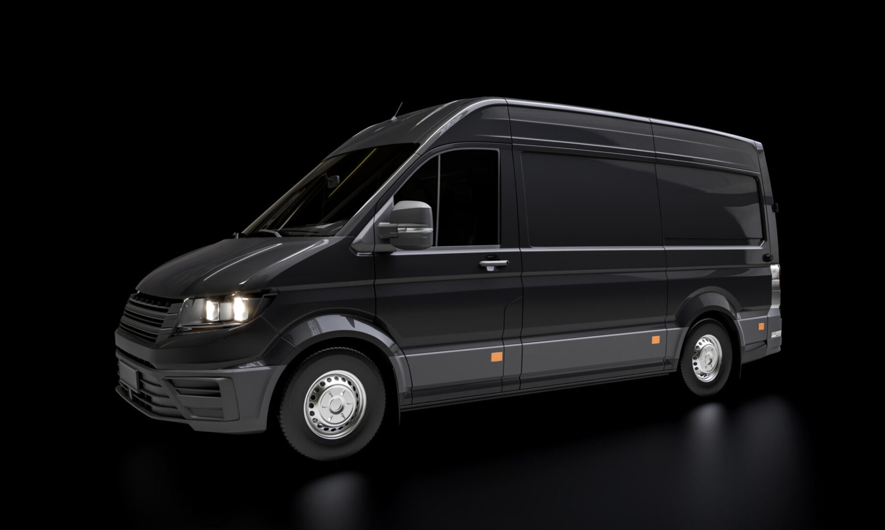 Sleek black modern cargo van with illuminated headlights on a dark background.